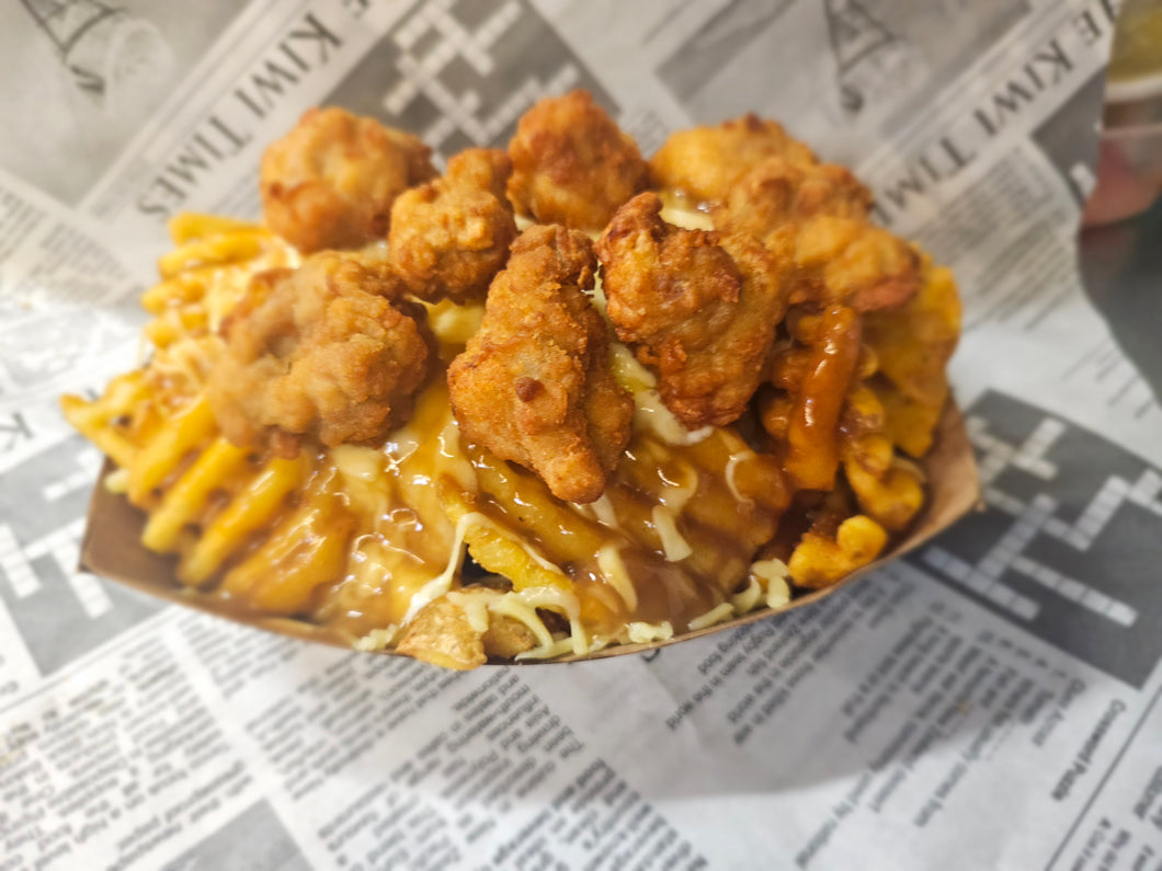 Loaded fried chicken cheesey gravy waffle fries